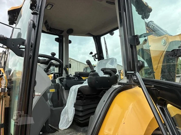 Cat Backhoe - control and cab detail